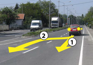 Slika uz pitanje: U situaciji prikazanoj na slici kretanje vozila unazad