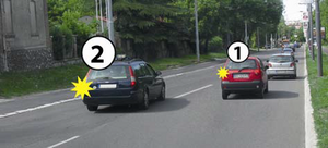 Slika uz pitanje: U situaciji prikazanoj na slici vozaču vozila označenog brojem 1