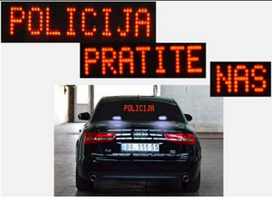 Slika uz pitanje: Svetlosni znak na vozilu policije, prikazan na slici označava